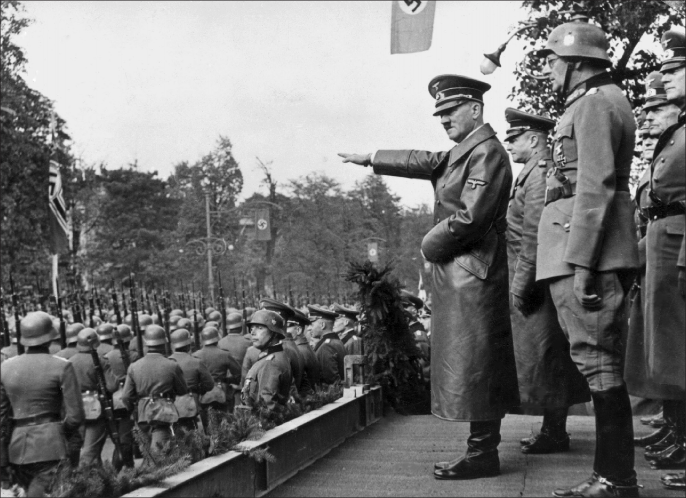 Adolf Hitler reviews parade of German troops on Aleje Ujazdowskie in Warsaw, Poland, October 5, 1939 (Polish National Digital Archives)